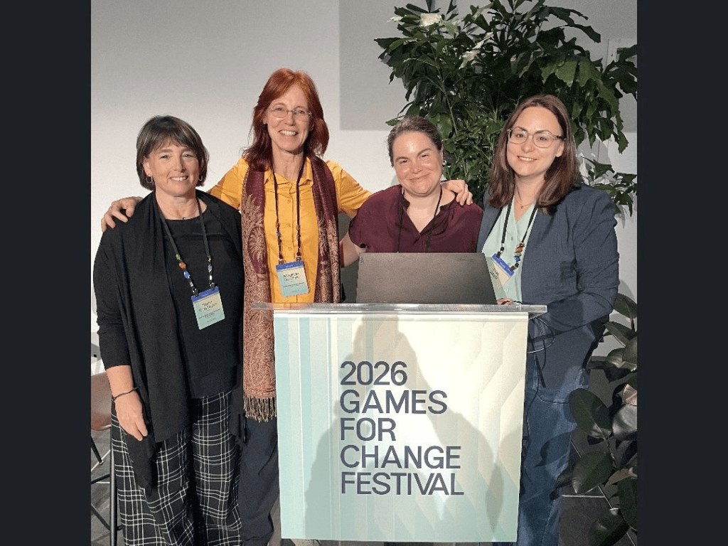 Four individuals (Meghan Gardner, Elizabeth M. H. Newbury, Risa Ward, and Tracy Costigan) standing behind a podium.